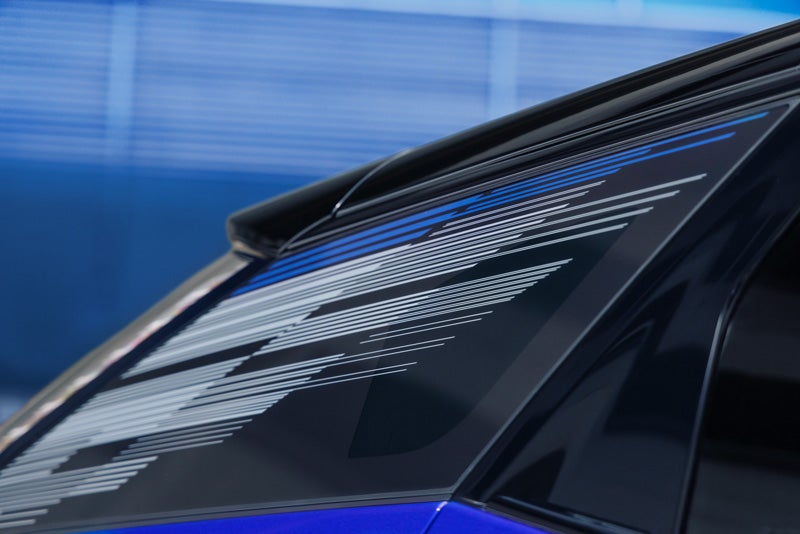 Close-up of the Modern Pattern on the 2026 OPTIQ-V Rear Quarter Glass | Russ Braunecker Auto Group in EFFINGHAM IL